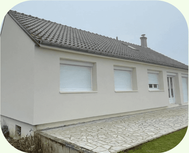 Photo d'une maison ayant bénéficié de l'isolation de sa facade avec un enduit de finition